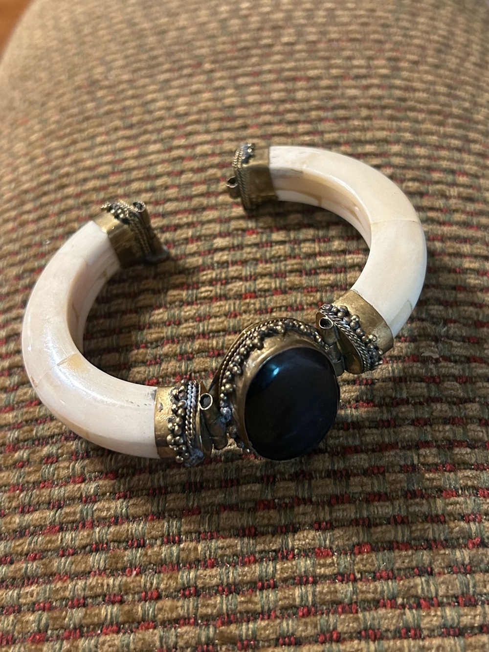 handcrafted vintage-style hinged tribal bangle